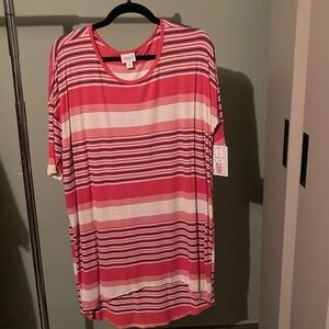 Lularoe medium pink blue and white striped Irma shirt